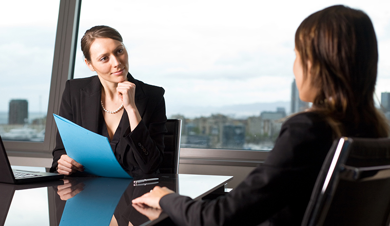 Two people in an appraisal meeting