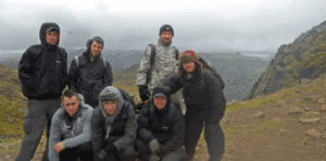 Contact services employees scale great heights for charity