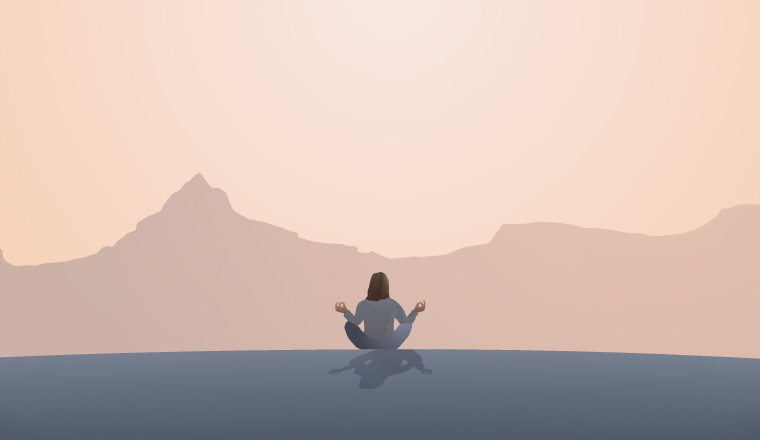 A woman meditated in from on some distant mountains