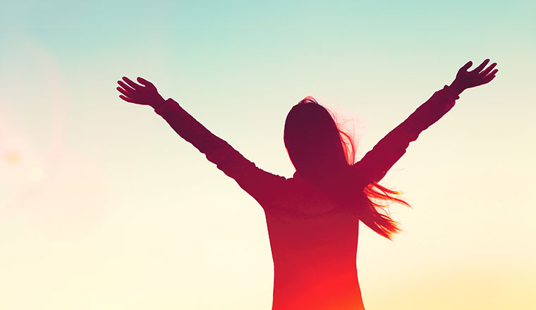 A picture of somebody making a freedom pose