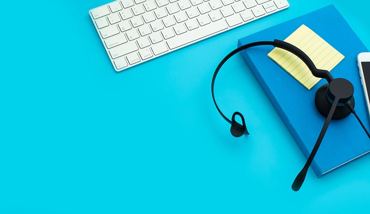Call Centre headset and notepad