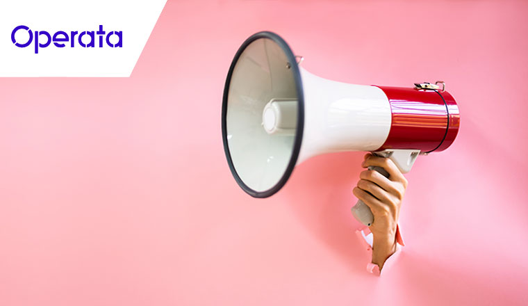 Hand and megaphone from hole in wall - announcement concept