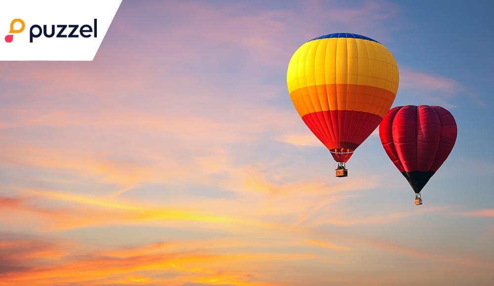 Hot air balloon floating in vivid sky - launch concept