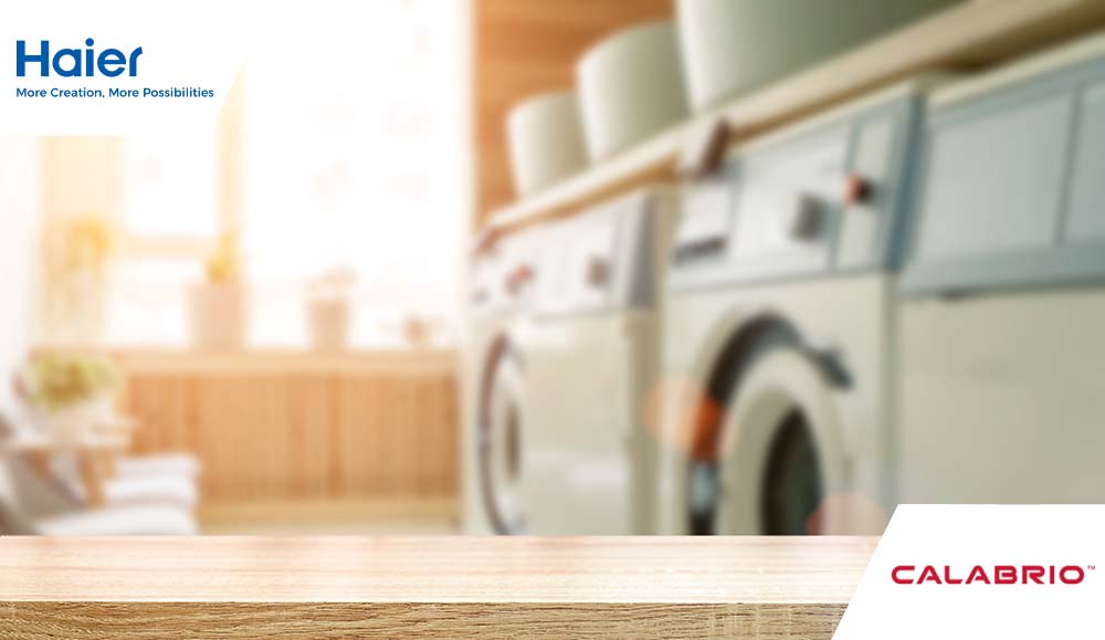Blurred home laundry room with wooden table
