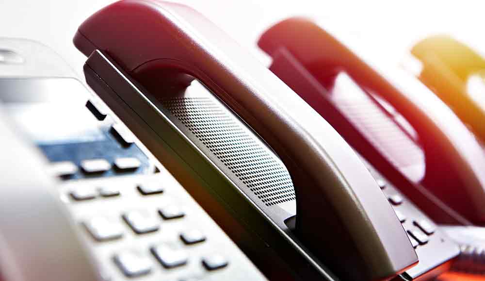 Handsets of office phones in a row