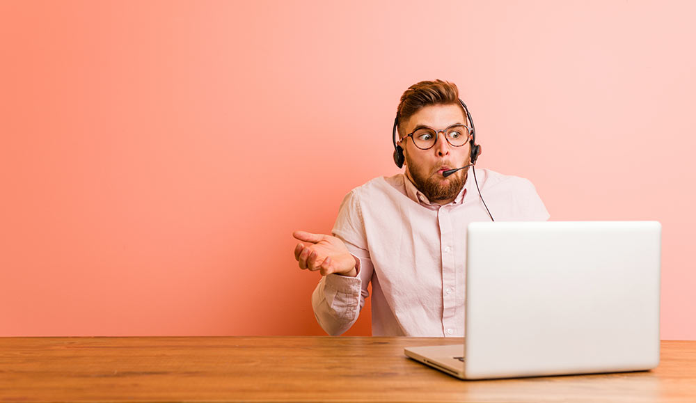 Person working in a call centre shrugging their shoulders