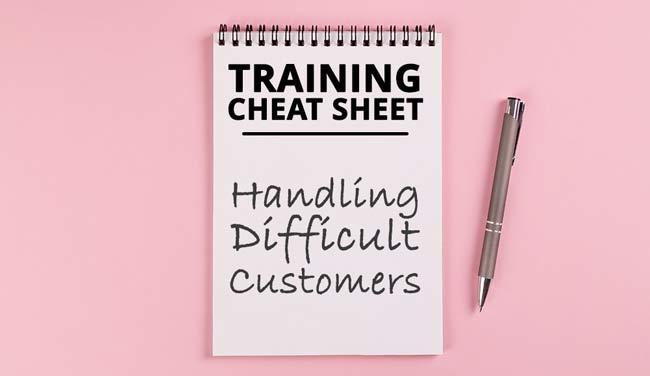 A notebook and pen - training cheat sheet for handling difficult customers