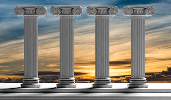 4 pillars on a sunset background