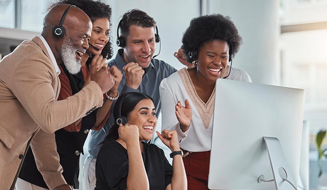 Call centre employees celebrating