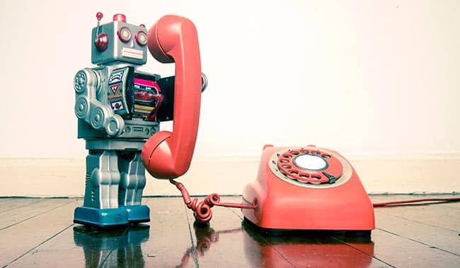 Robot holding a telephone