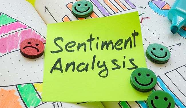 Sentiment analysis written on a post it note