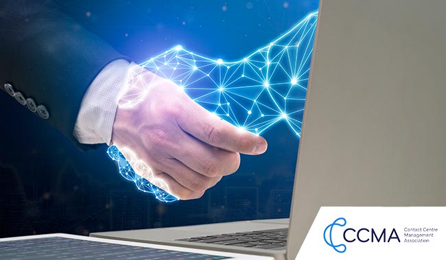 Person shaking someone's hand out of a laptop