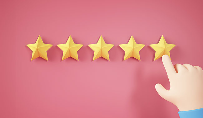 5 golden stars on a pink background