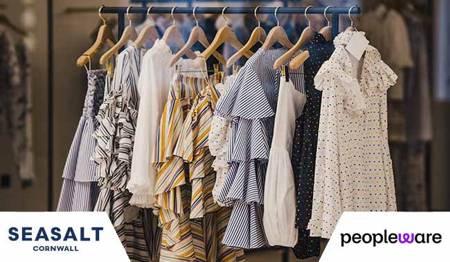 Lots of summer clothes on a rail
