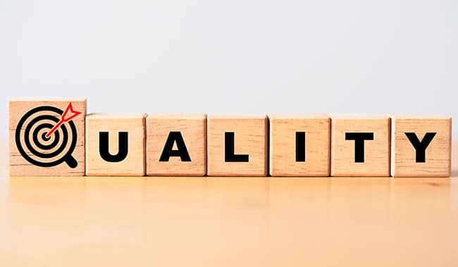 The word Quality on wooden blocks