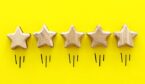5 golden stars on a yellow background