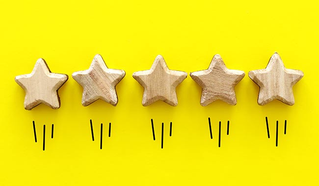 5 golden stars on a yellow background