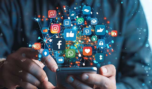 Person on their phone with social media icons out of it