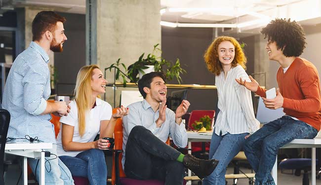 Office employees laughing