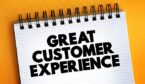 The word Great Customer Experience on a notepad