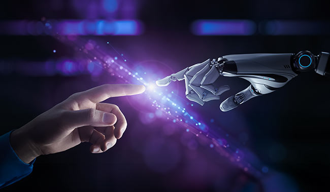 Human hand touching a robot hand