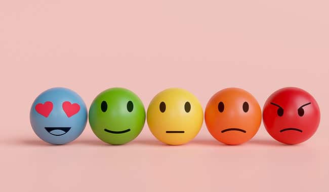 Five faces on a pink background