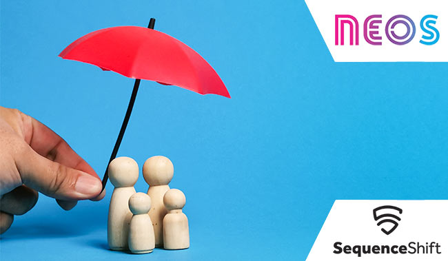 Family of wooden blocks with a red umbrella over the top shielding them