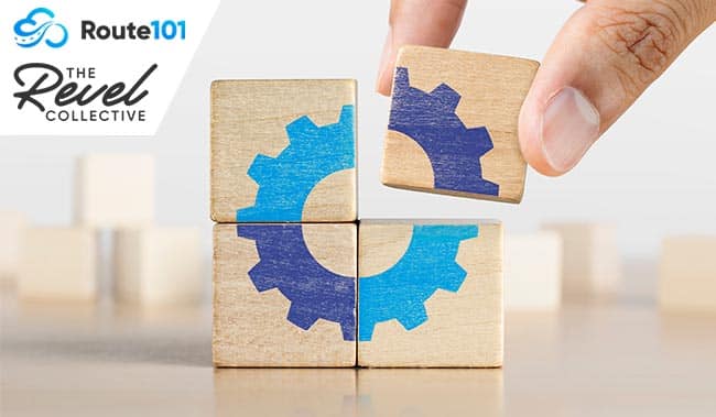 Hand putting the last piece of wooden blocks with the gear icon