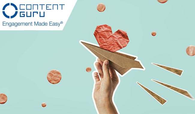Person holding a paper aeroplane with a paper heart out the top