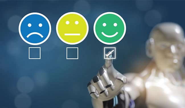 Robot pointing to a smiley face