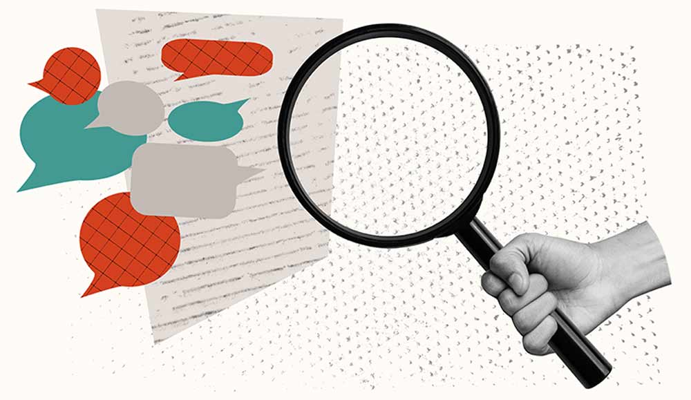 A hand holding a magnifying glass over a piece of paper with speech bubbles