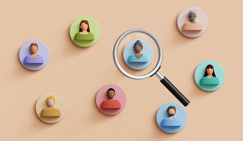 People icons with a magnifying glass