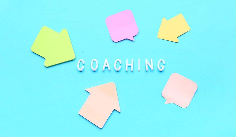 coaching word on blue background