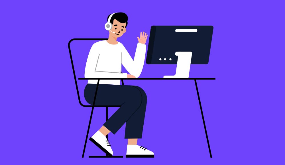 Call centre worker sat at desk on a call