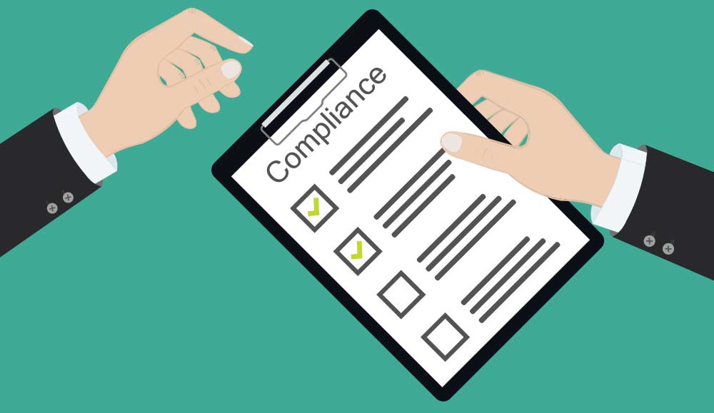 Person holding a clipboard with the word compliance on it and a checklist