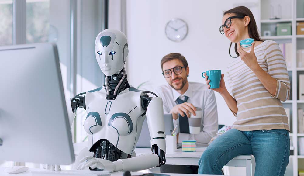 Happy employees with a robot